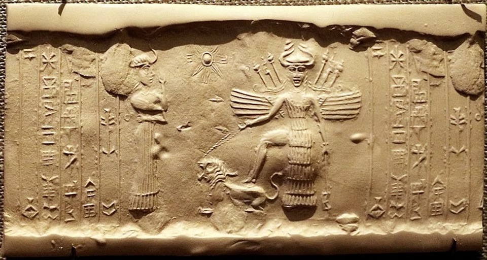 Ancient Mesopotamian cylinder seal impression showing a winged goddess resting one foot on a crouching lion